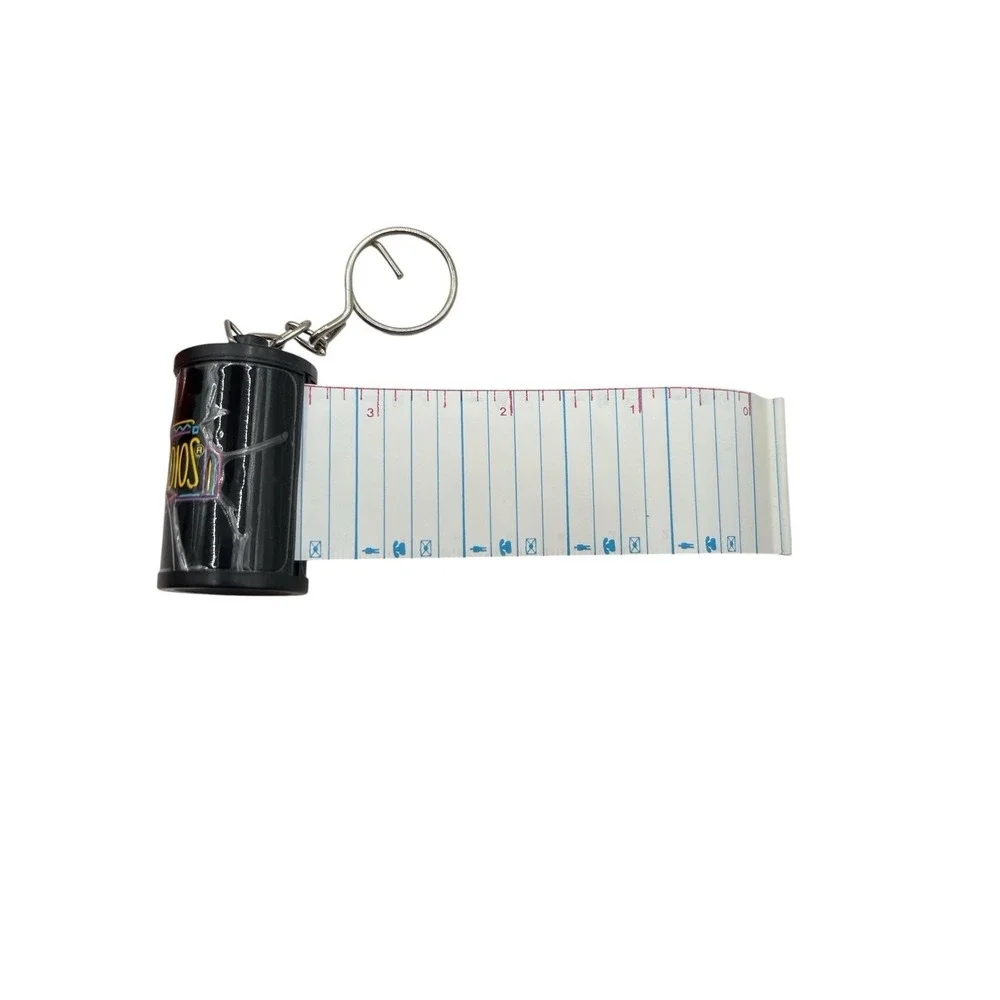 UNIVERSAL STUDIOS FILM ROLL‎ KEYCHAIN MINI ADDRESS BOOK